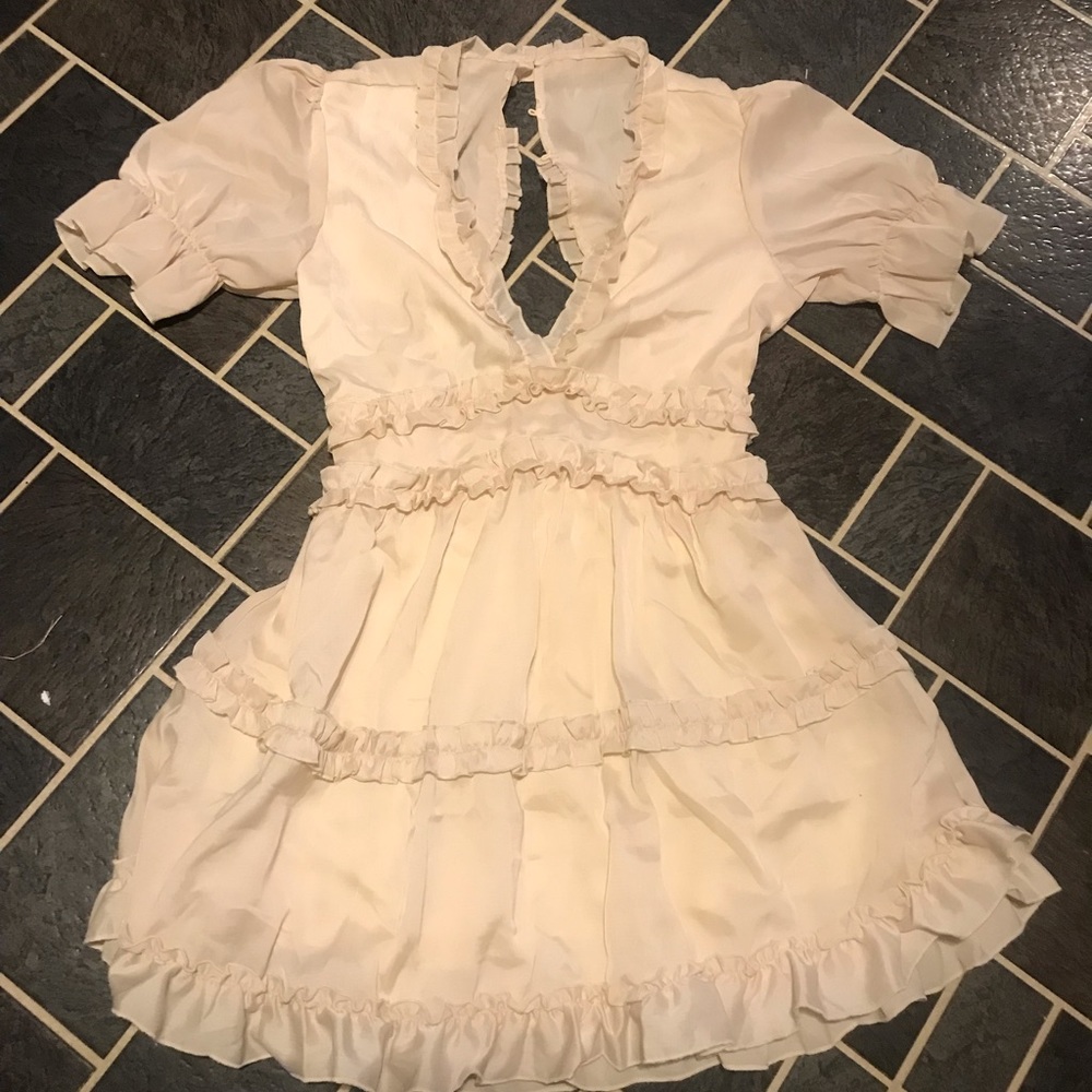 Completely adorable ruffle mini dress perfect for rehearsal dinner/party.
